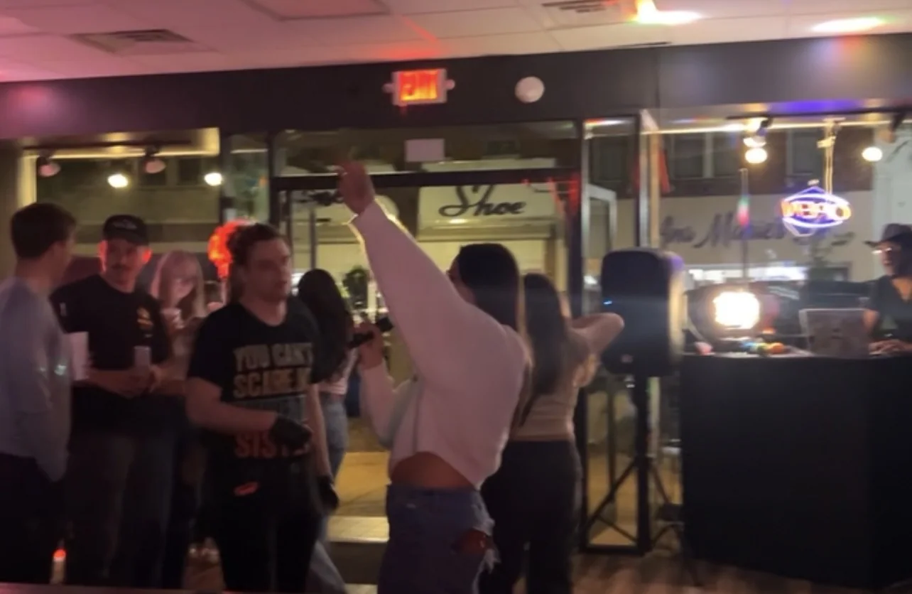 Guests singing karaoke at Cold Cocked Frozen Liqueurs