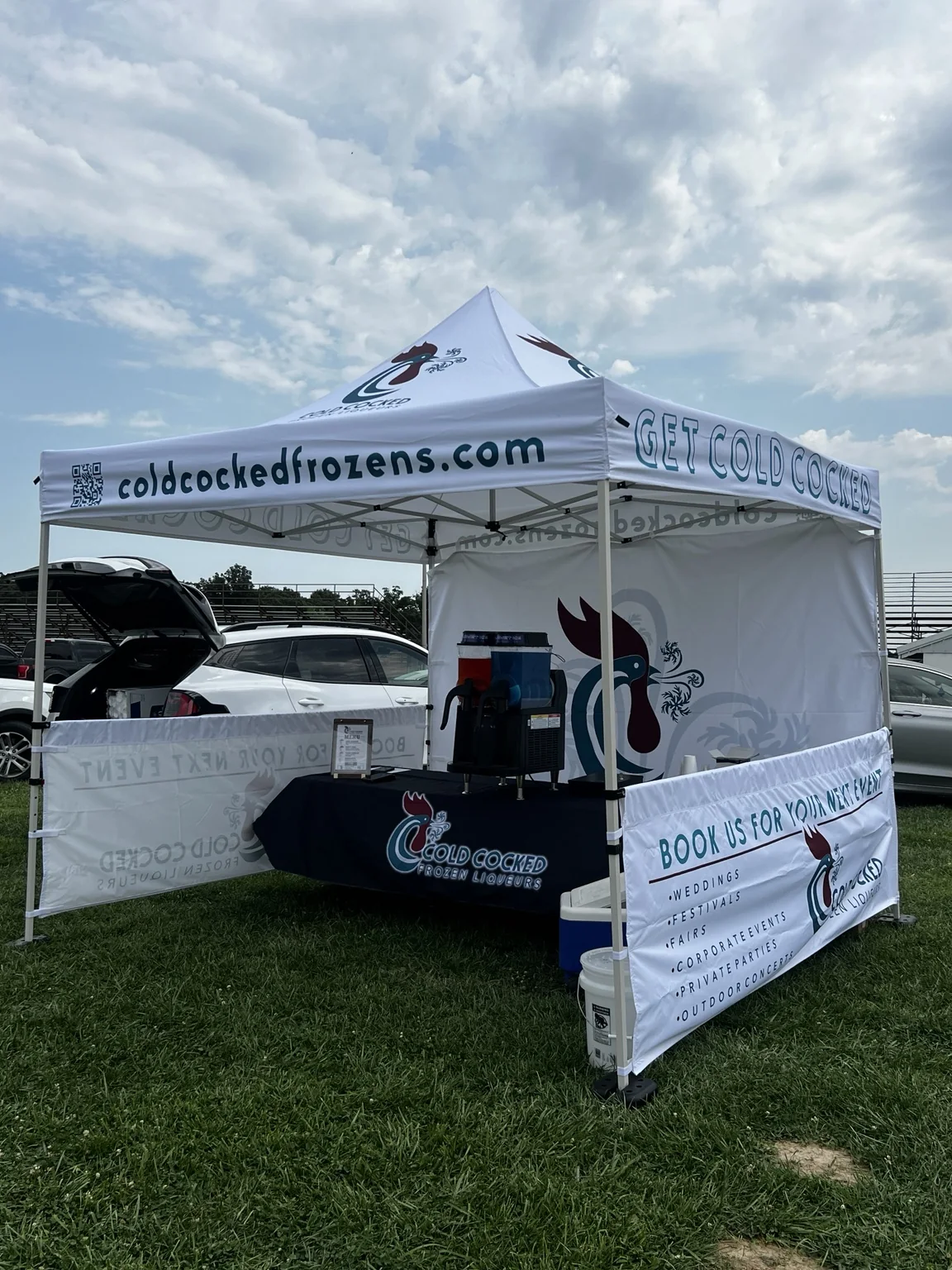 Cold Cocked branded mobile frozen bar tent at an outdoor event